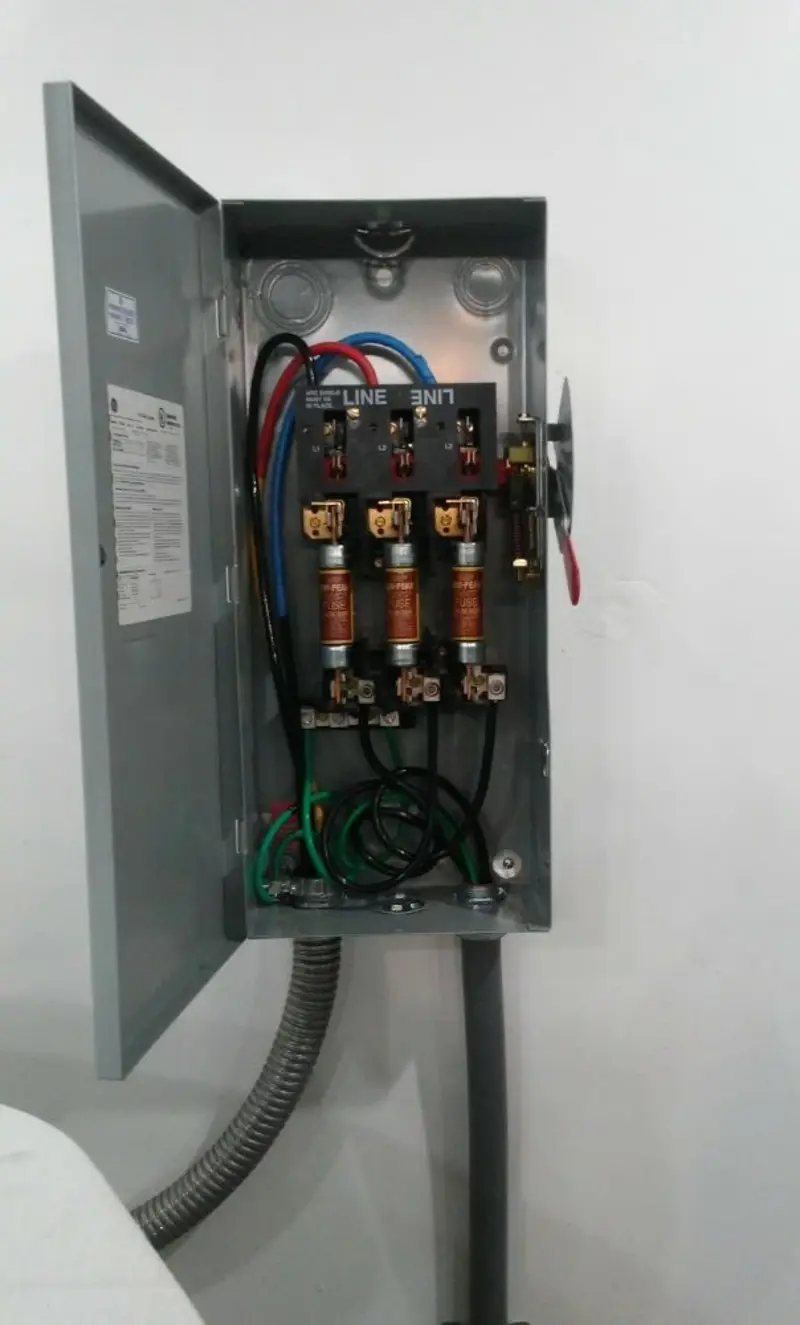 Three-phase disconnect switch installed for Smoke Detector Installation in Mentor-on-the-Lake