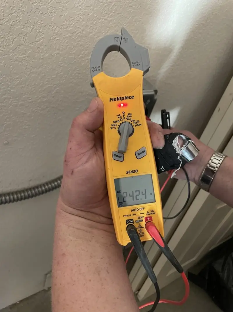 Voltage testing with clamp meter during Electrical Installation Services in Mentor-on-the-Lake